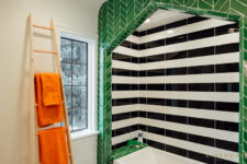 11 This is another bathroom with black and white and green tiles, so bold and cool