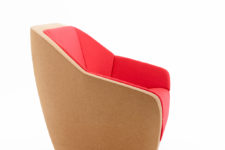 11 cork chair with hot red upholstery is a cool statement in a modern space