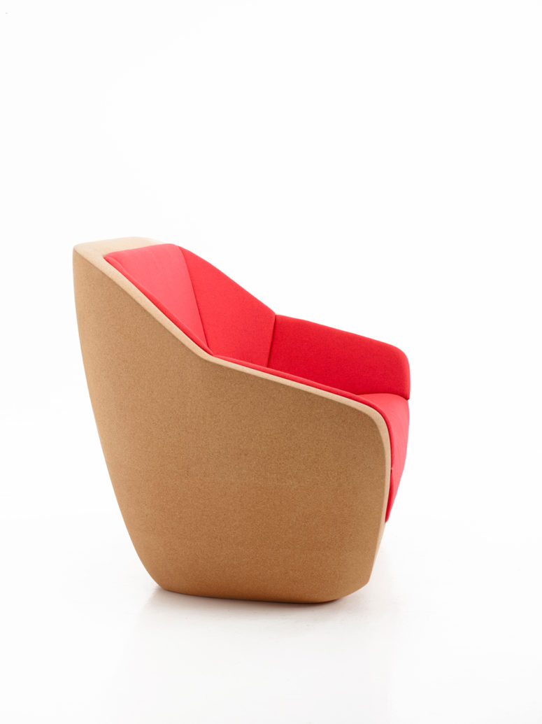 cork chair with hot red upholstery is a cool statement in a modern space