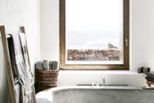 12 sunken concrete bathtub in the bedroom for a spa feel