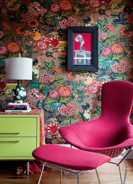 whimsy interior decor with a fuchsia chair and ottoman