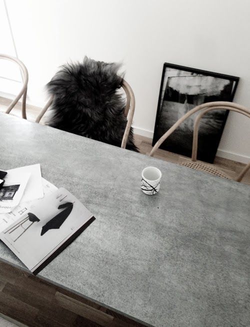 dining table with a concrete countertop