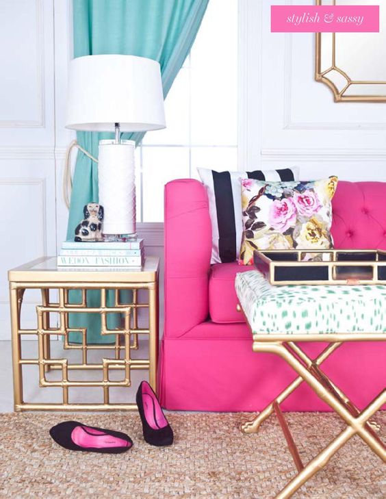 glam feminine living room with a fuchsia sofa