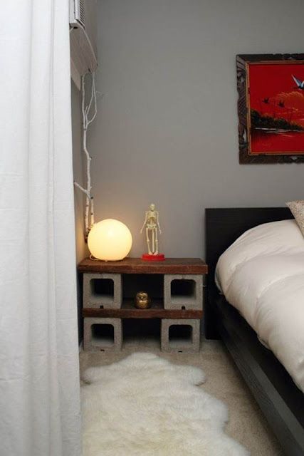nightstand with a concrete block base and a wooden top