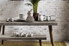 18 concrete dining set with a table and a bench