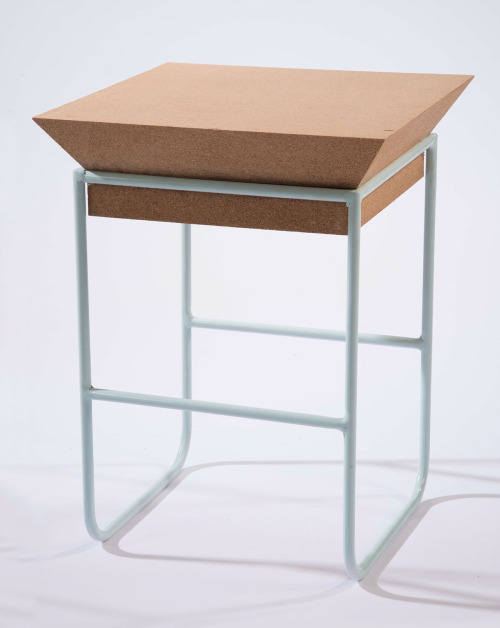 geometric stool with a cork seat and white framing for a modern interior