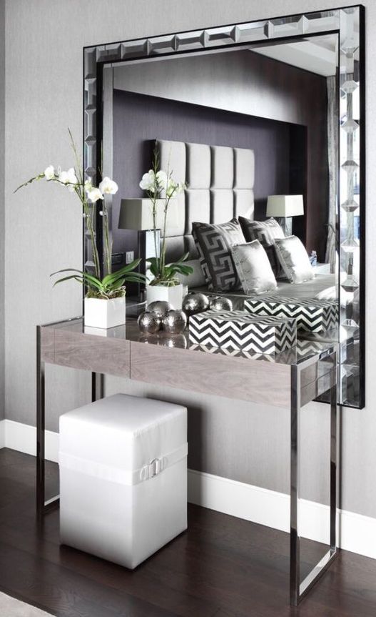 mirror layering with console legs and a sleek top surface