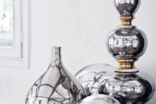 18 silver metallic vases and accessories look awesome in group