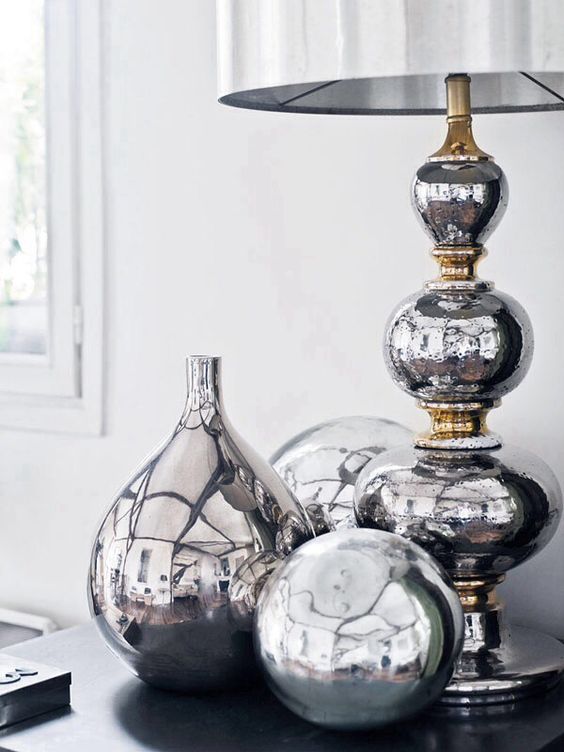 silver metallic vases and accessories look awesome in group