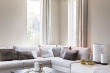 20 clean modern living room with light taupe walls and curtains
