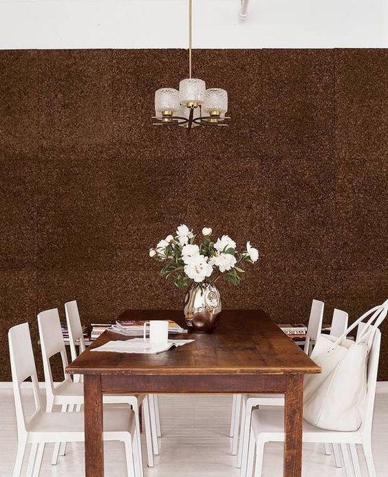 dark cork statement wall for a dining space