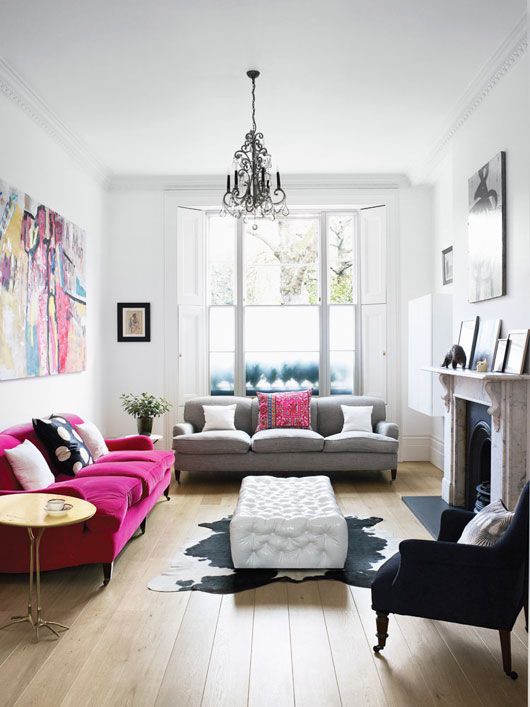 hot pink sofa turns this living room into a whimsy space
