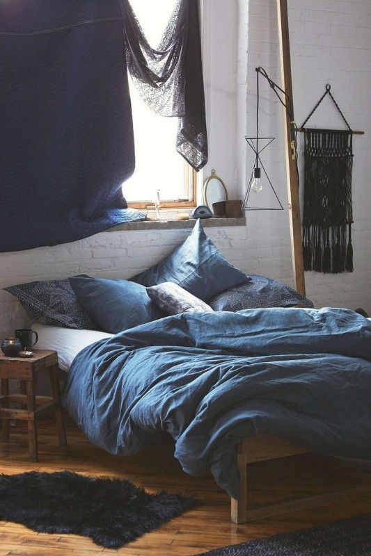 boho-style bedroom and bed wwith indigo bedding