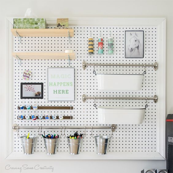 Multi functional pegboard organizer with shelves, rails and magnetic stripes