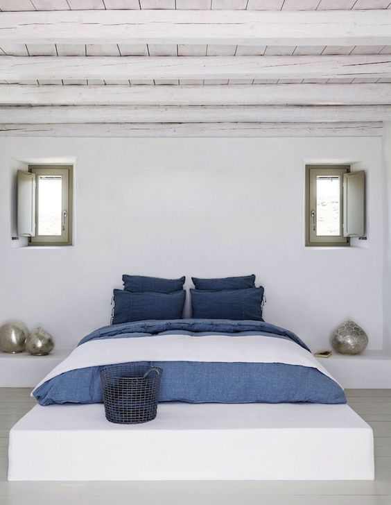 Denim style bedding with additions of wwhite for a seaside home