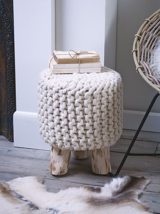 even a simple wooden stool can be covered with chunky knit and given a cozy look