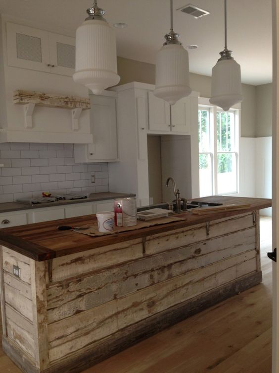 shabby kitchen island completely built of pallet wood