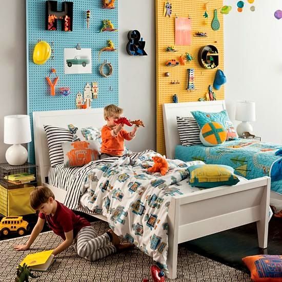 pegboards of different colors over beds will show each kid's space and differentiate the beds