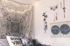26 your jewelry displayed, a silver boho blanket and photos can make the bedroom boho-chic