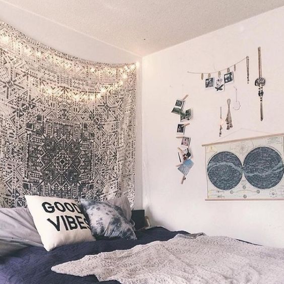 your jewelry displayed, a silver boho blanket and photos can make the bedroom boho-chic