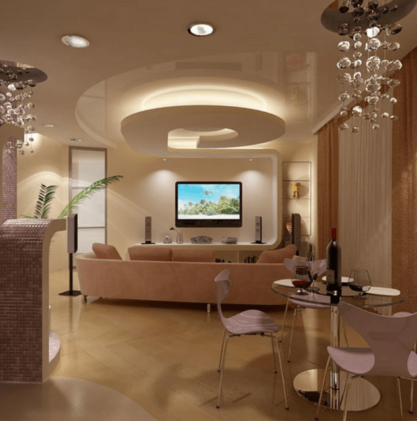 sleek ceiling with various levels of light and different chandeleirs
