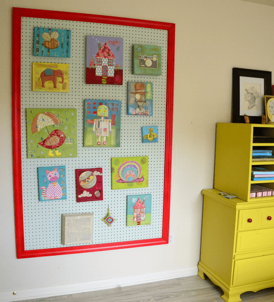 framed pegboard for displaying kids' drawings