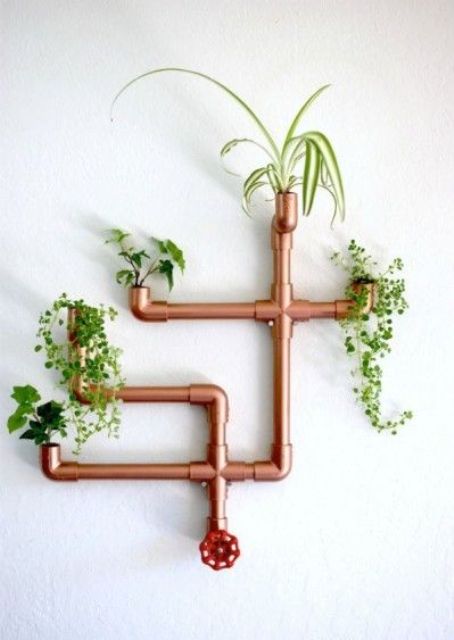 a steampunk or industrial interior will look great with a copper piping planter