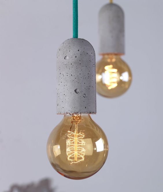 concrete socket lights with colored bulbs for industrial spaces