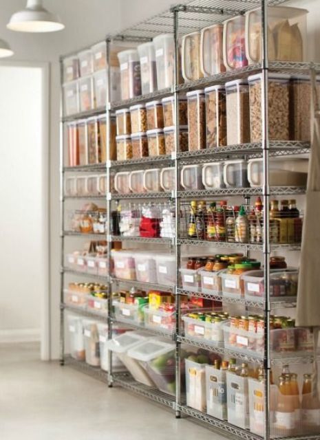 Plastic air tight containers and wire baskets on metal shelving units