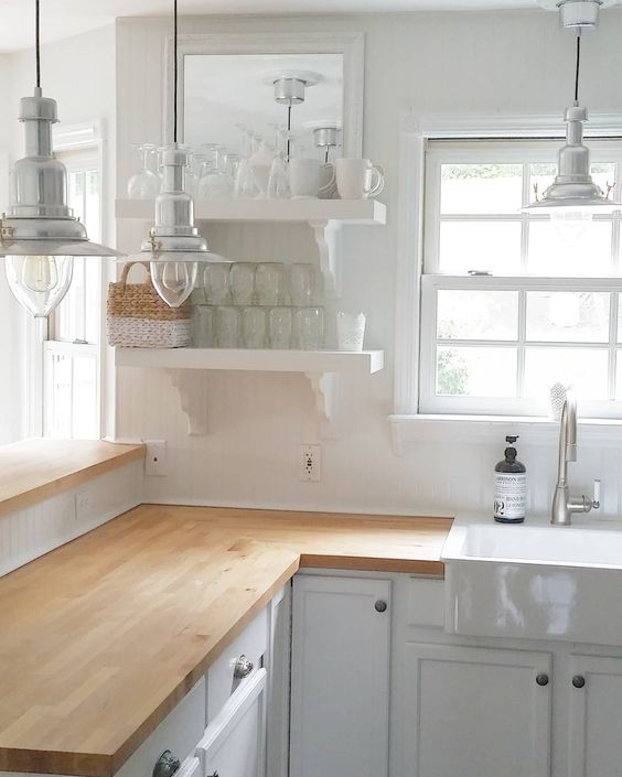 white kitchen decor in farmhouse style and with butcher block countertops