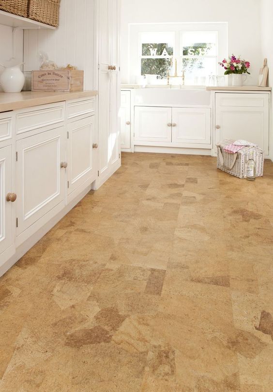 cork floors give this kitchen somewhat a warm rustic touch