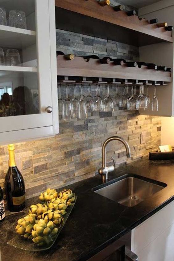 faux stone kitchen backsplash adds texture to the decor