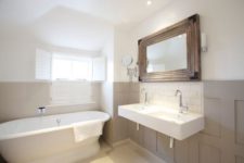 31 simple neutral bathroom with a free-standing bathtub