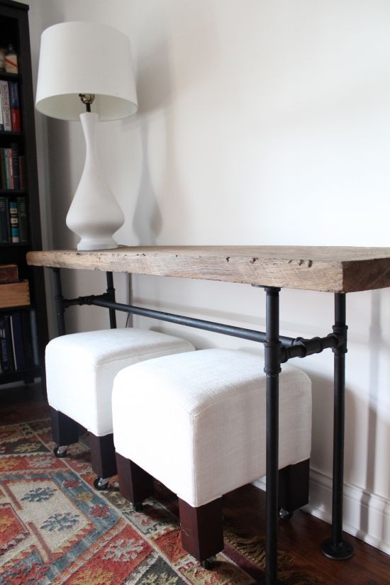 black pipe console table with a wooden top