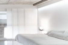 37 minimalist bedroom with polished concrete floors and a concrete ceiling