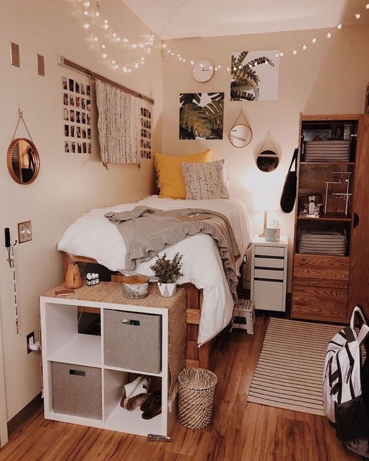ikea kallax is a practical storage solution for a dorm room that can act as a room divider (via undefined)