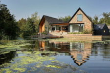 01 This modern lakeside home looks like a cozy countryside cottage, with several volumes interconnected and gable roofs