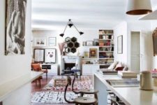 01 This stunning Paris apartment was decorated in boho chic style mixing modern Western furniture and Oriental items and artworks