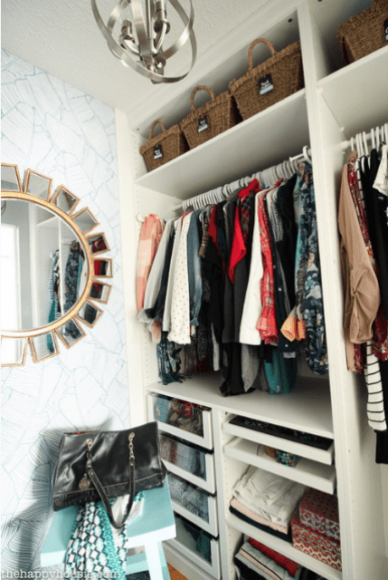 The closet was organized with the help of IKEA Pax system, which is very comfortable for any kind of storage