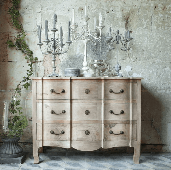 Beautiful light colored wood vintage dresser with antique candle holders
