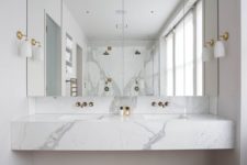 03 a floating marble vanity top gives a feeling of luxury to the space