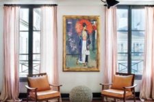 04 The apartment is filled with light and an open layout helps with that, bold artworks and textiles make it chic and eye-catchy