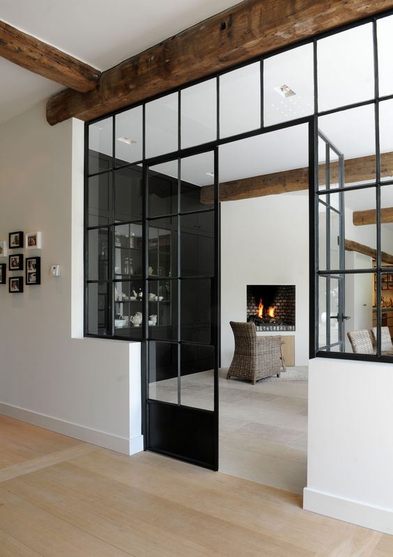 black framed French doors for connecting the interiors with each other