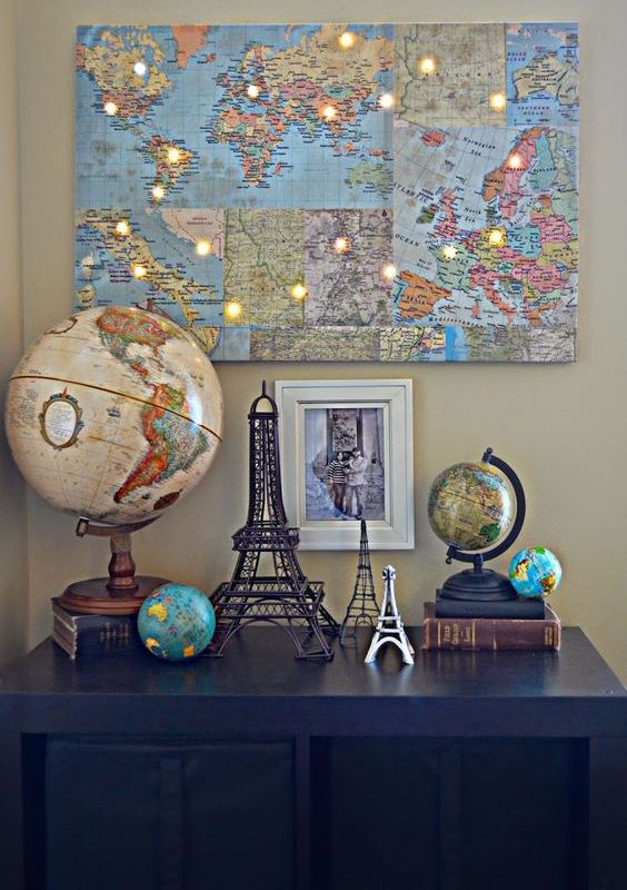 Map collage with lights that point the trip destinations.