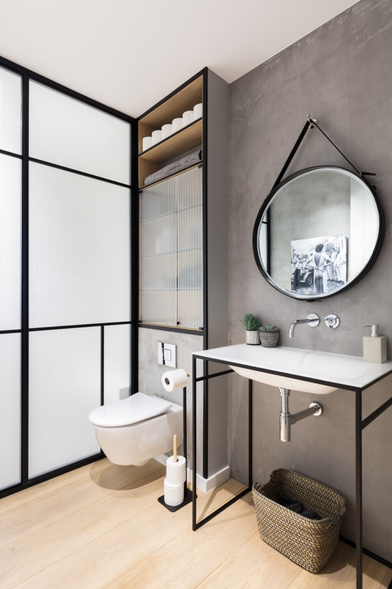 Black framing in the bathroom is a cool idea to accentuate the space
