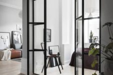 05 Scandinavian interiors with black framed French doors to fill the spaces with light