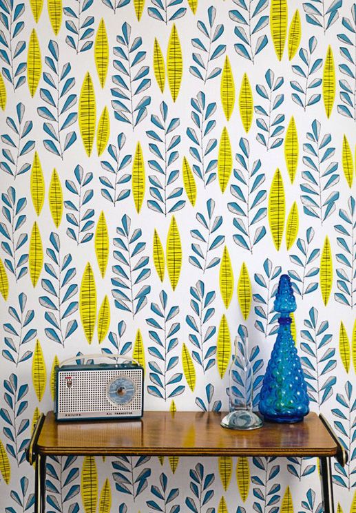 crazy blue and yellow botanical print wallpaper for an entryway