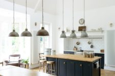 07 rustic and industrial kitchen decor with lot of warm woods and pendant lamps that unite the space