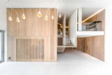08 Wooden walls look surprisingly cool and contemporary, and they are highlighted with cool ceiling lamps with a surreal design