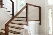 08 dark wood and cable railing with white steps look chic and modern